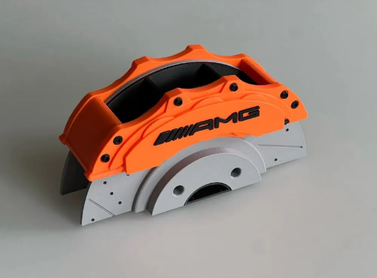AMG orange brake caliper pen holder