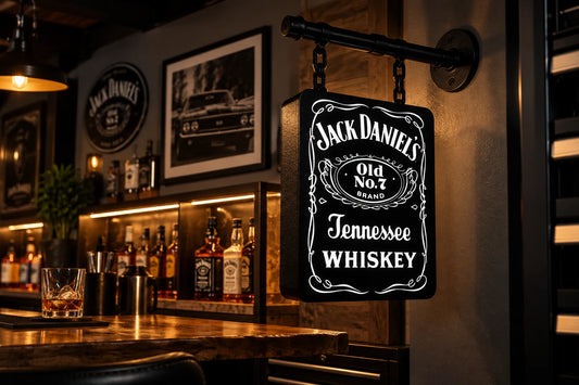 Black and white Jack Daniel's light box hanging from a pipe arm over a home bar