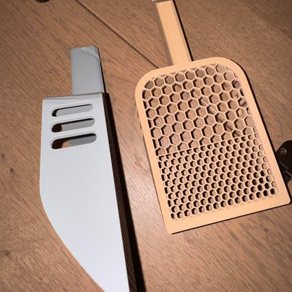 Cat litter scoop with a honeycomb sifting grid, view 2