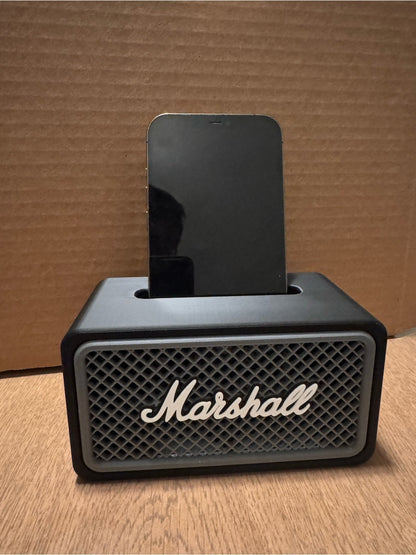 Retro amp phone speaker stand on a cardboard backdrop
