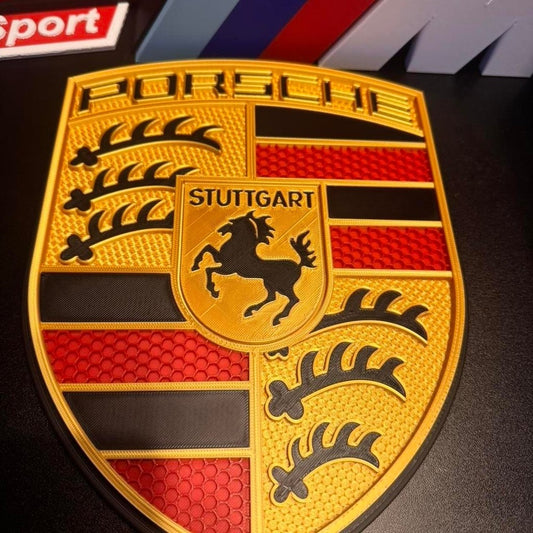 Porsche crest wall art in yellow, red and black