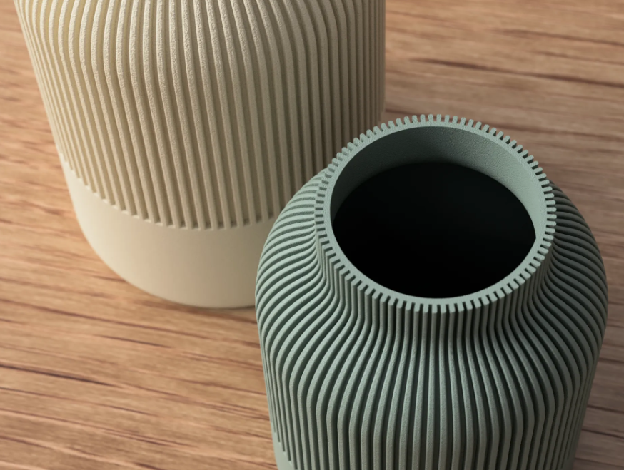 Close-up of the ribbed texture and rim on a sage green vase