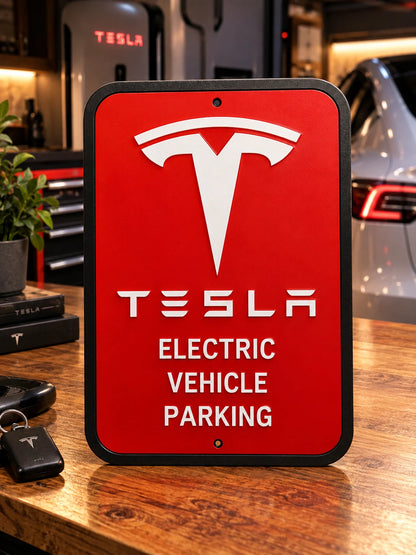 White letters, logo and outline, red background, Tesla EV parking sign on a wooden desk in a garage