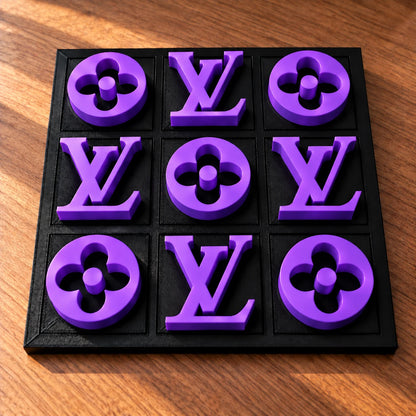 Black board with purple pieces, full set of nine in warm window light