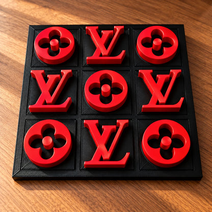 Black board with red pieces, full set of nine in warm window light