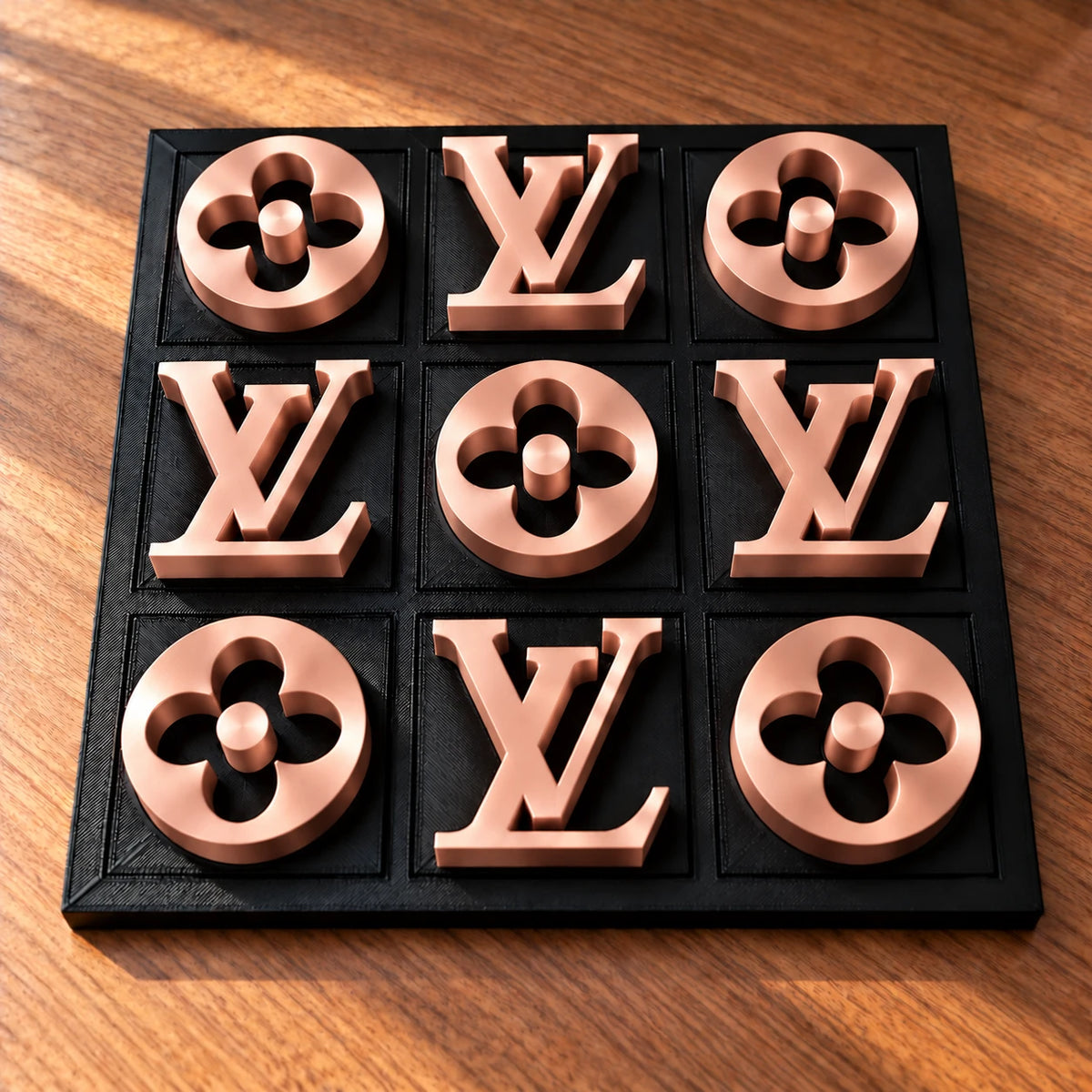 Black board with rose gold pieces, full set of nine in warm window light
