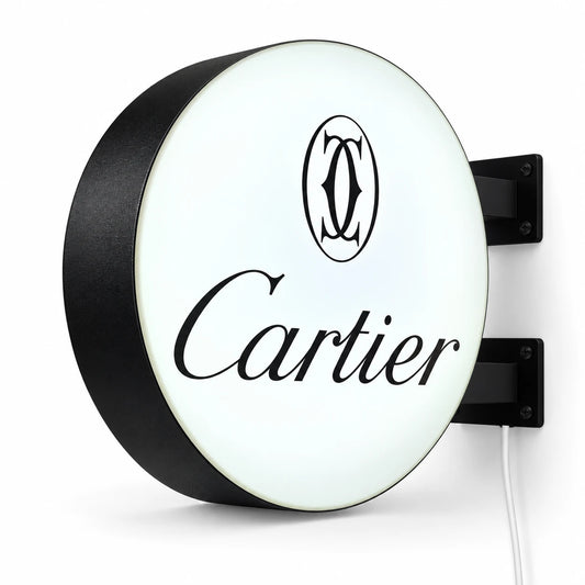 White round double-sided light box with black wall brackets and a white cord